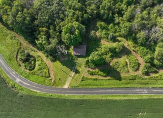 35-Acre Southwest Wisconsin Hunting Camp with Proven Whitetail History, Hardwood Ridges & Turnkey Game-Care Setup