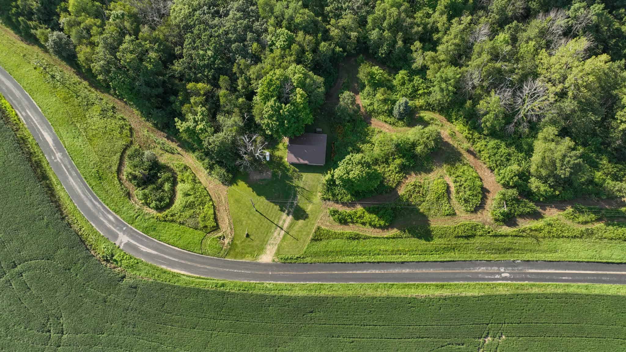 35-Acre Southwest Wisconsin Hunting Camp with Proven Whitetail History, Hardwood Ridges & Turnkey Game-Care Setup