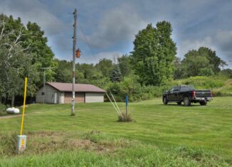 35-Acre Southwest Wisconsin Hunting Camp with Proven Whitetail History, Hardwood Ridges & Turnkey Game-Care Setup