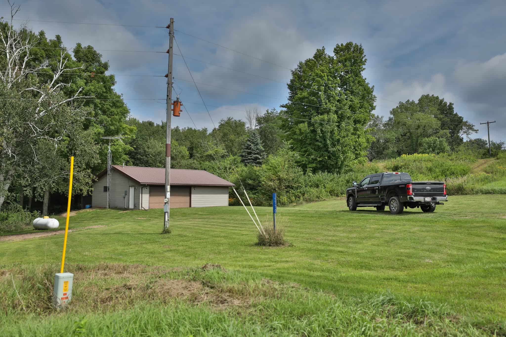35-Acre Southwest Wisconsin Hunting Camp with Proven Whitetail History, Hardwood Ridges & Turnkey Game-Care Setup