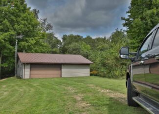 35-Acre Southwest Wisconsin Hunting Camp with Proven Whitetail History, Hardwood Ridges & Turnkey Game-Care Setup