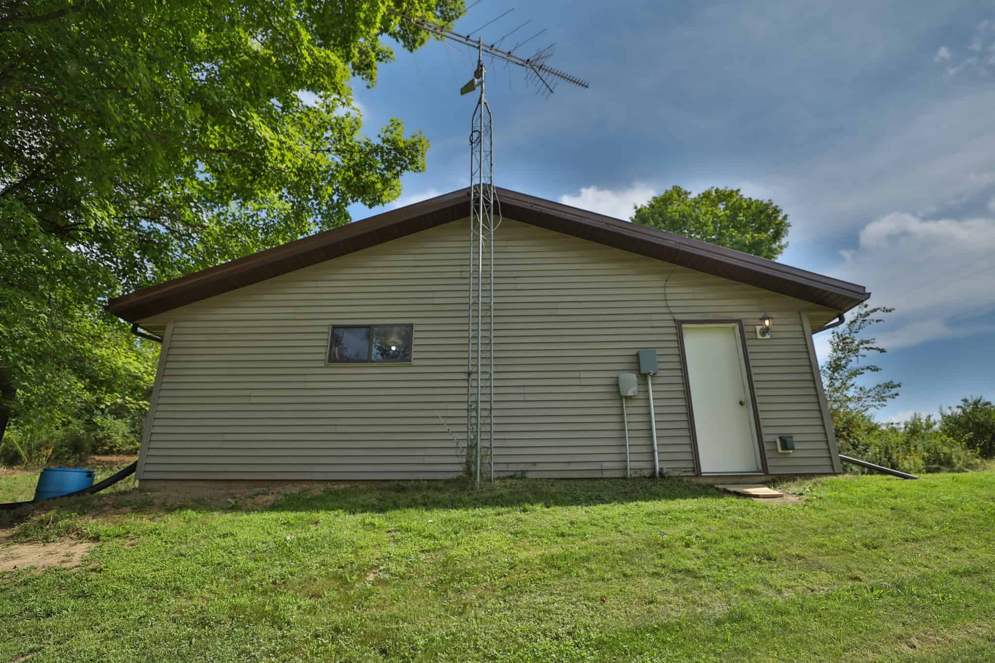 35-Acre Southwest Wisconsin Hunting Camp with Proven Whitetail History, Hardwood Ridges & Turnkey Game-Care Setup