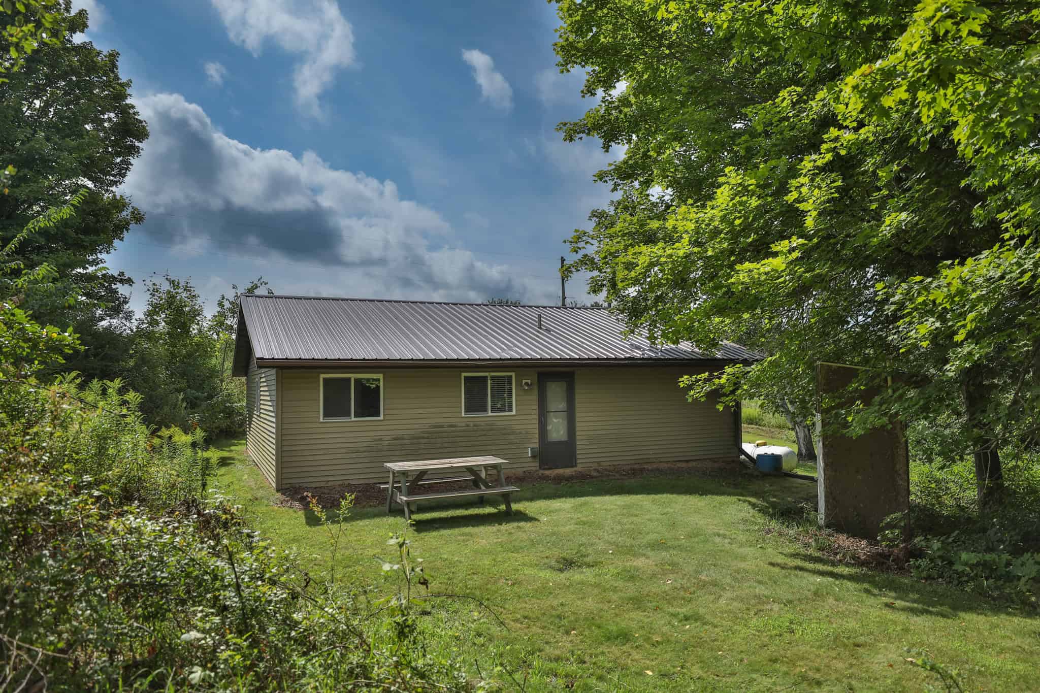 35-Acre Southwest Wisconsin Hunting Camp with Proven Whitetail History, Hardwood Ridges & Turnkey Game-Care Setup