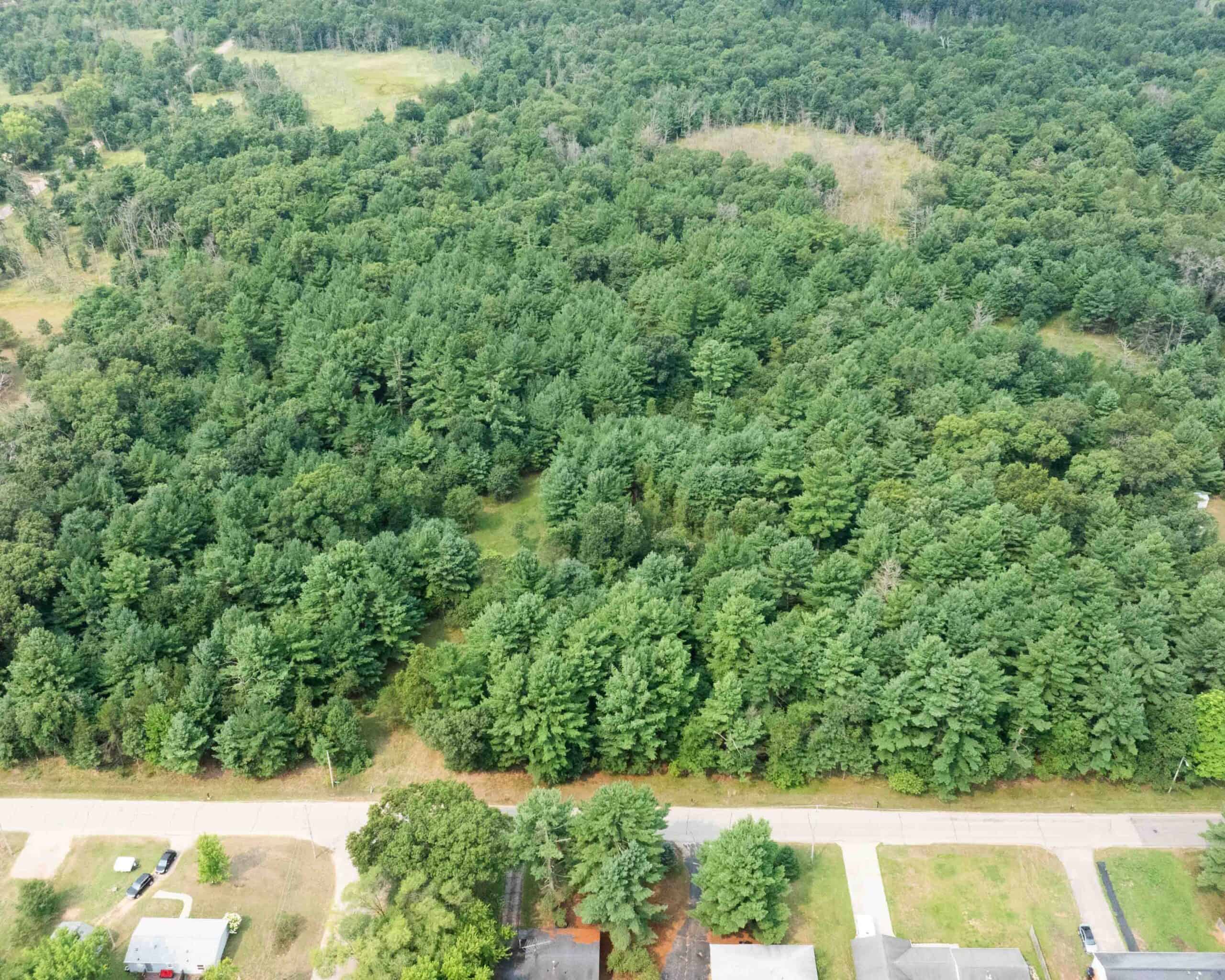 Rare opportunity to own 17.54 wooded acres within the City of Adams