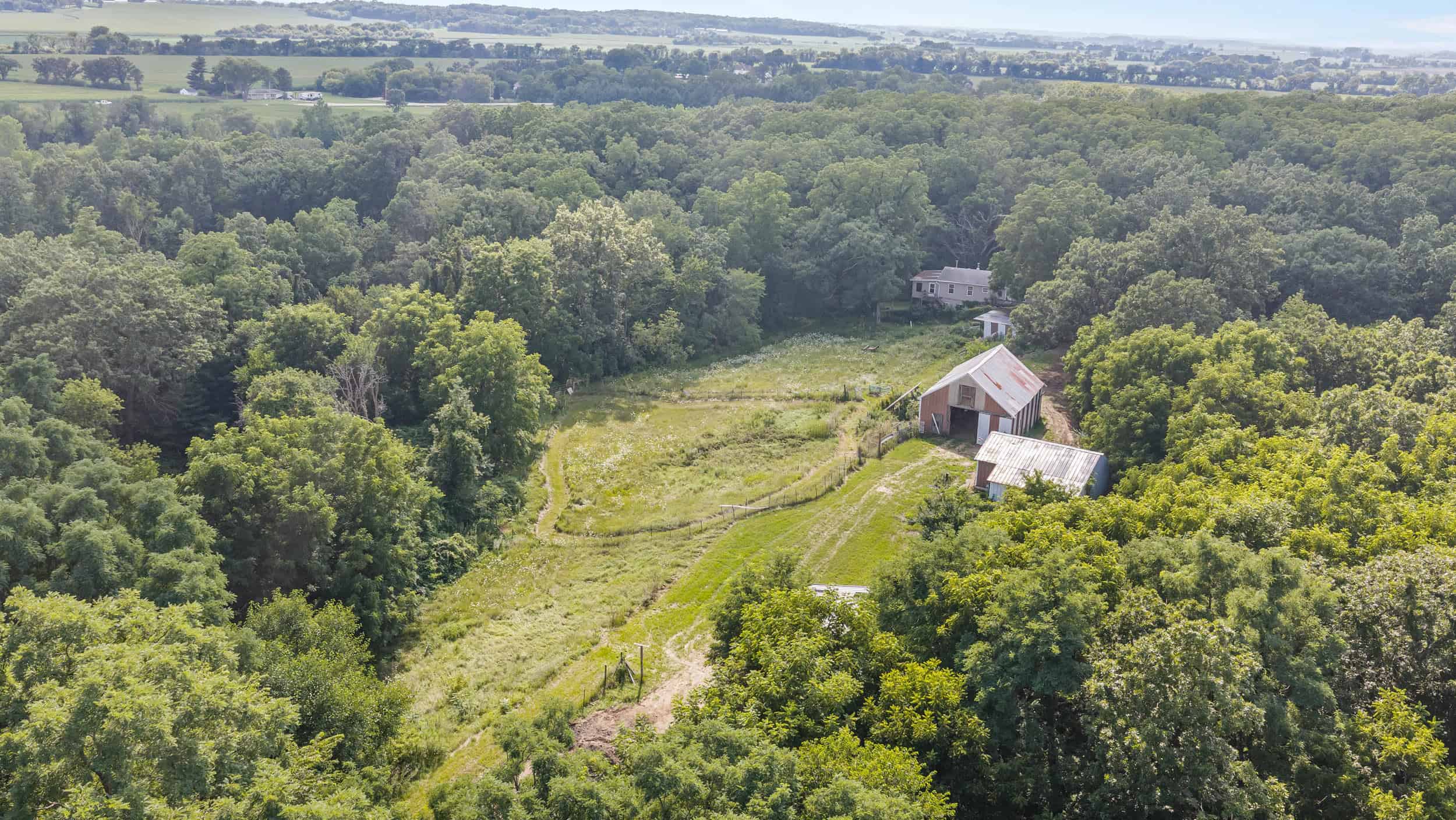 23+/- Acre Hobby Farm | Home | Pond | Outbuildings | Development Potential Online Auction