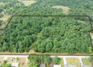 Rare opportunity to own 17.54 wooded acres within the City of Adams