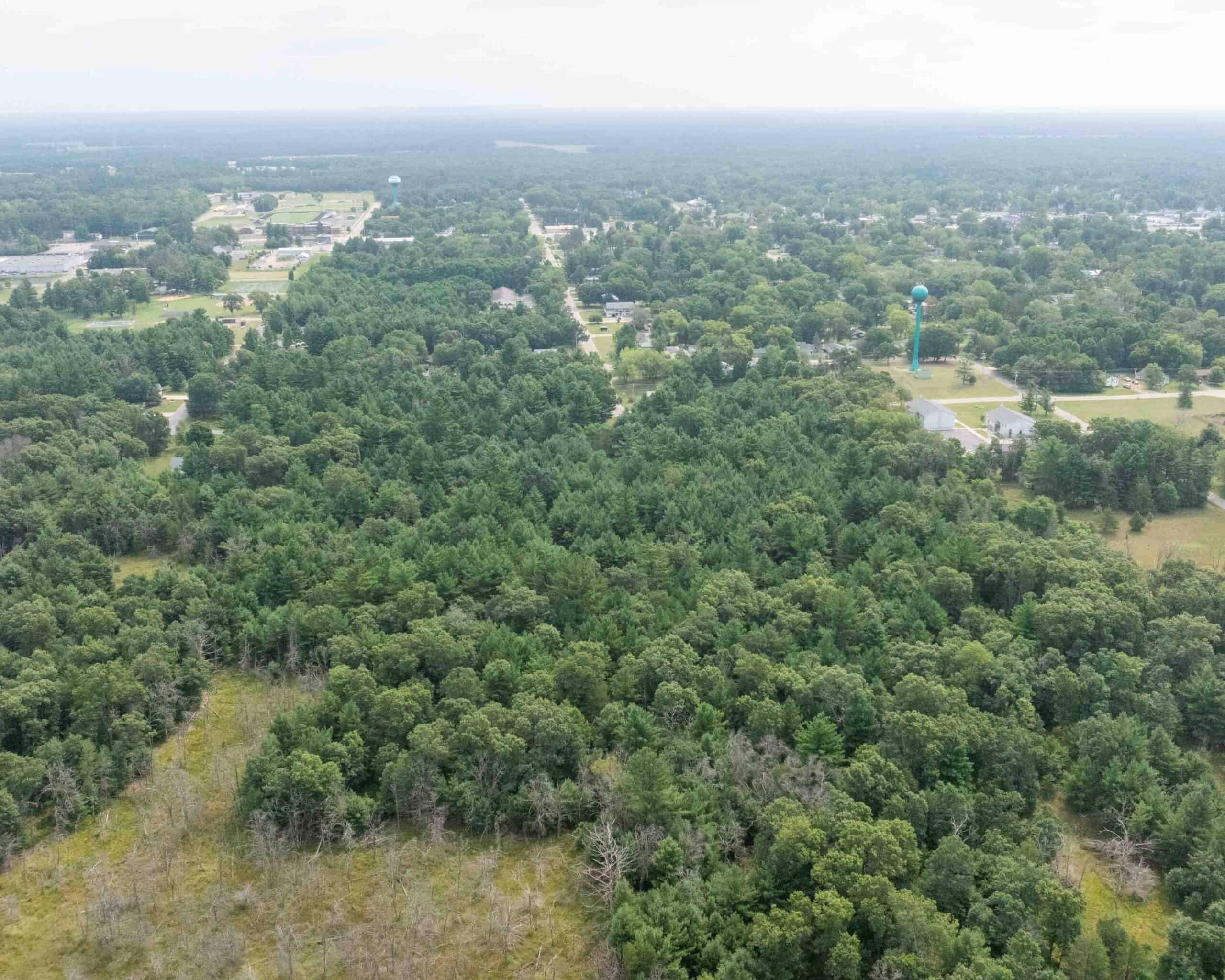 Rare opportunity to own 17.54 wooded acres within the City of Adams