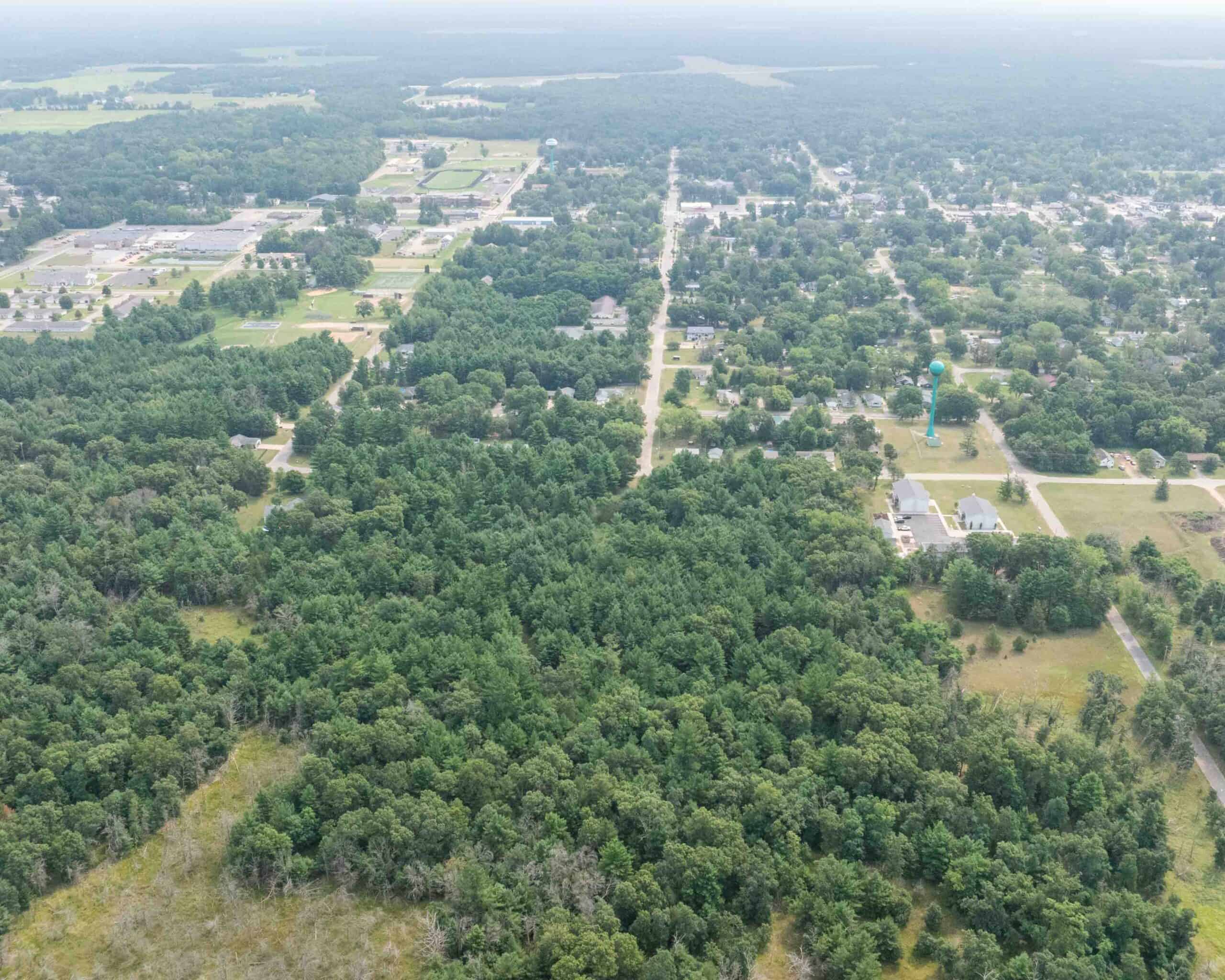 Rare opportunity to own 17.54 wooded acres within the City of Adams