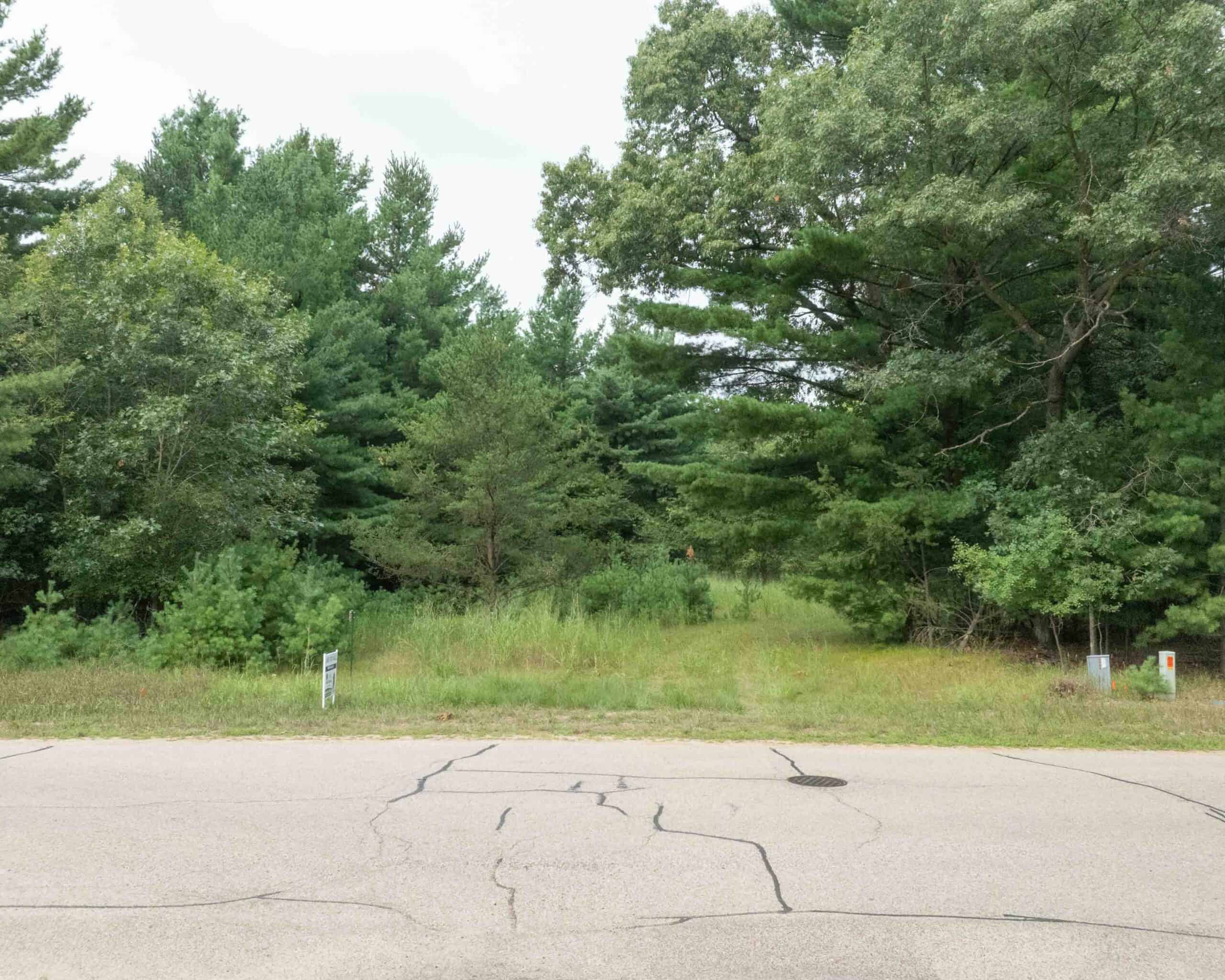 Rare opportunity to own 17.54 wooded acres within the City of Adams