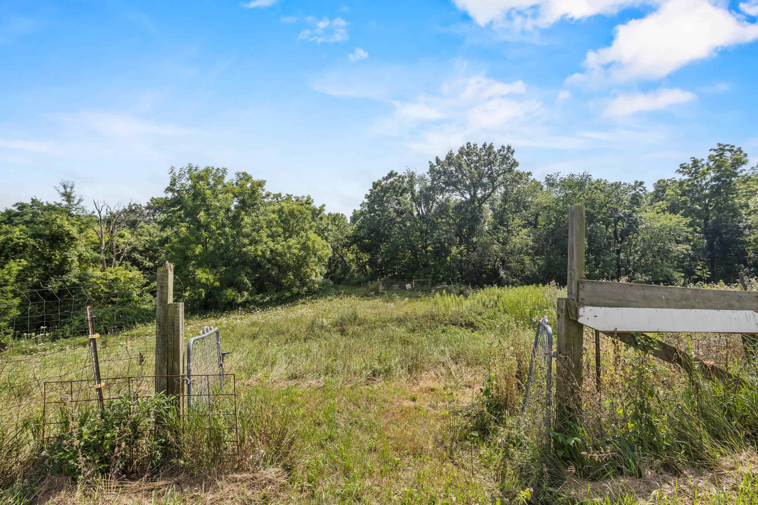 23+/- Acre Hobby Farm | Home | Pond | Outbuildings | Development Potential Online Auction