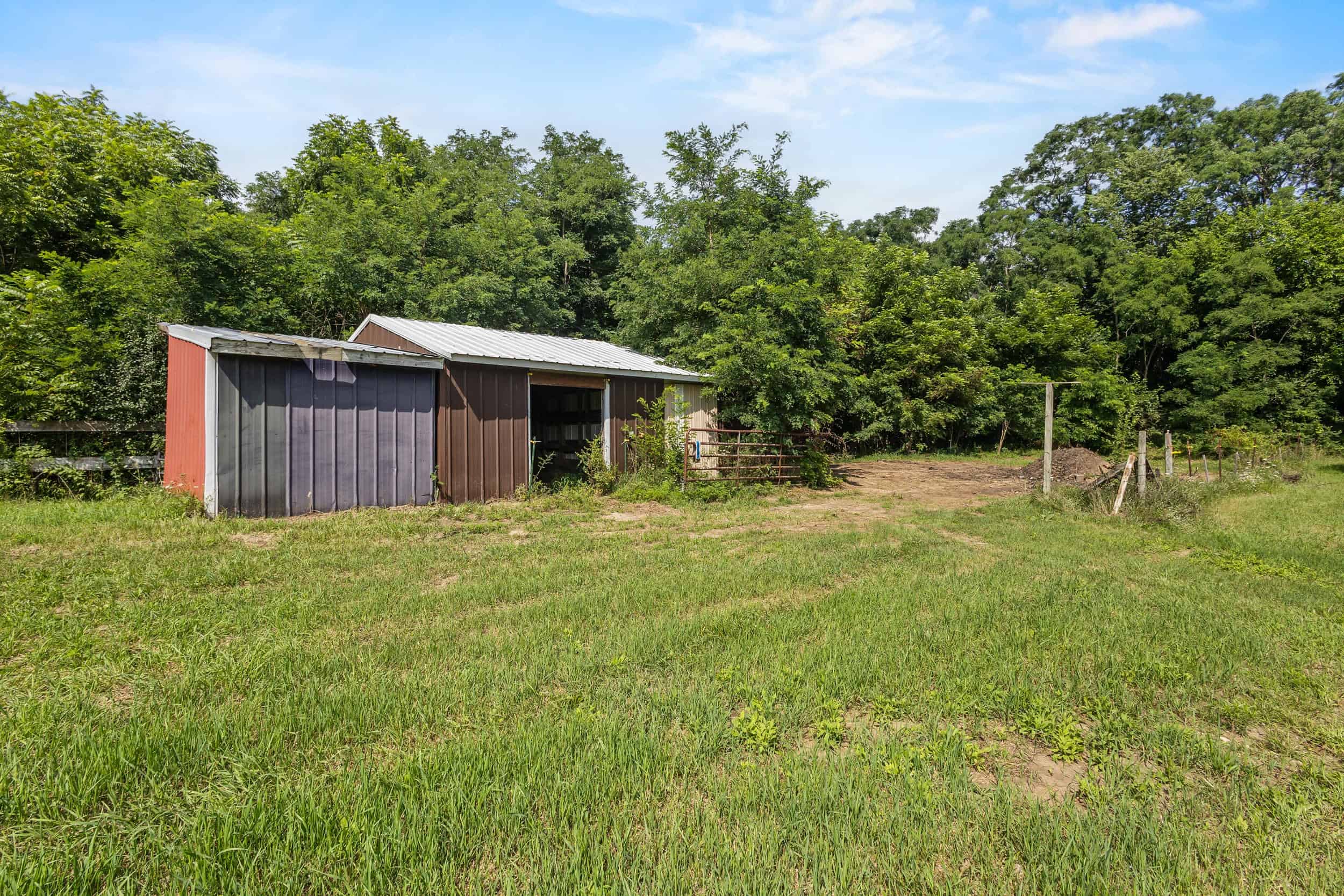 23+/- Acre Hobby Farm | Home | Pond | Outbuildings | Development Potential Online Auction