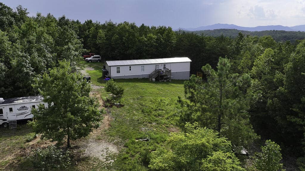 118 Acres of Riverfront Mountain Paradise