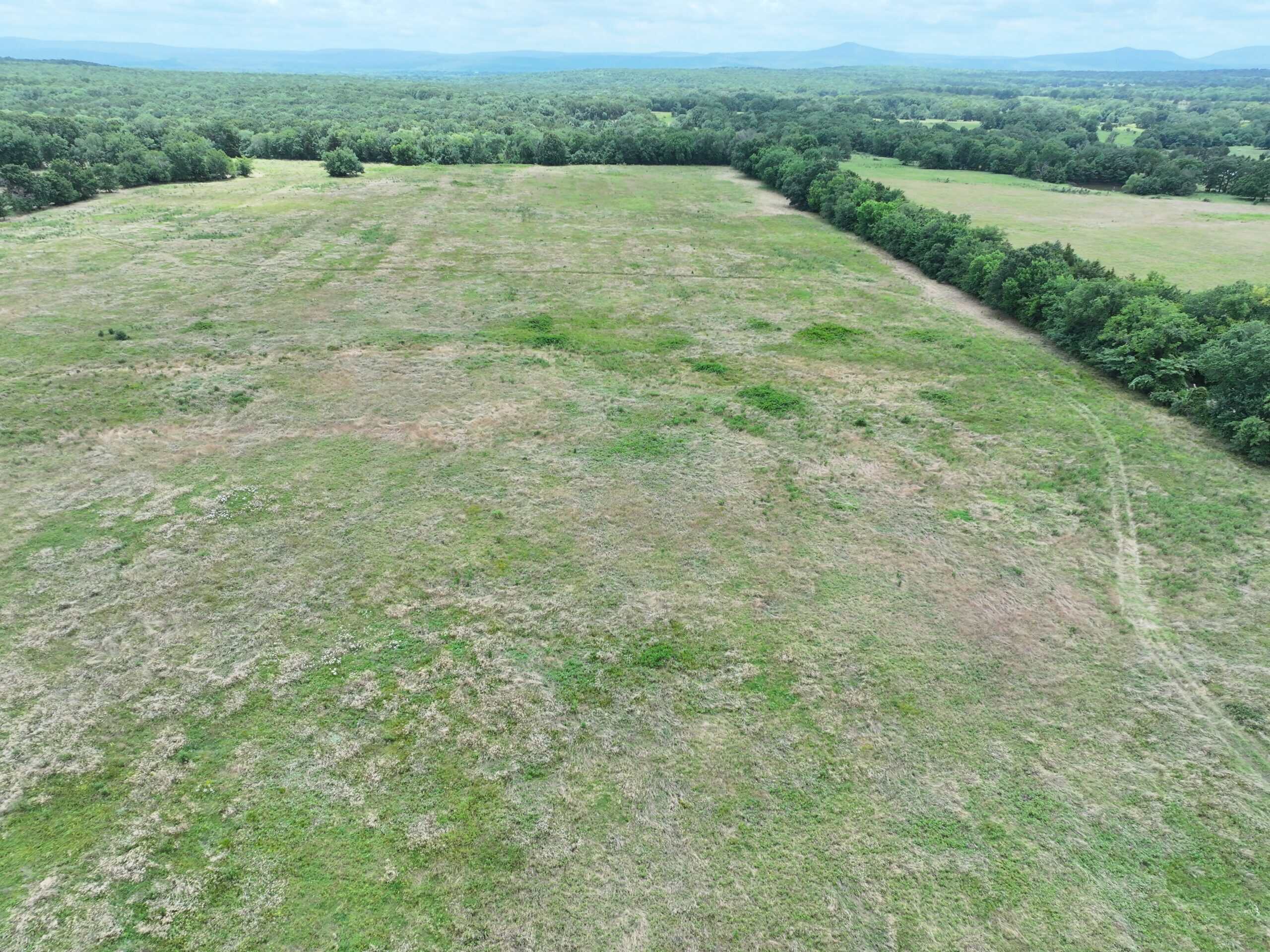 104± Acres of Whitetail Hunting, Hardwood Timber & Fishing Ponds in SE Oklahoma