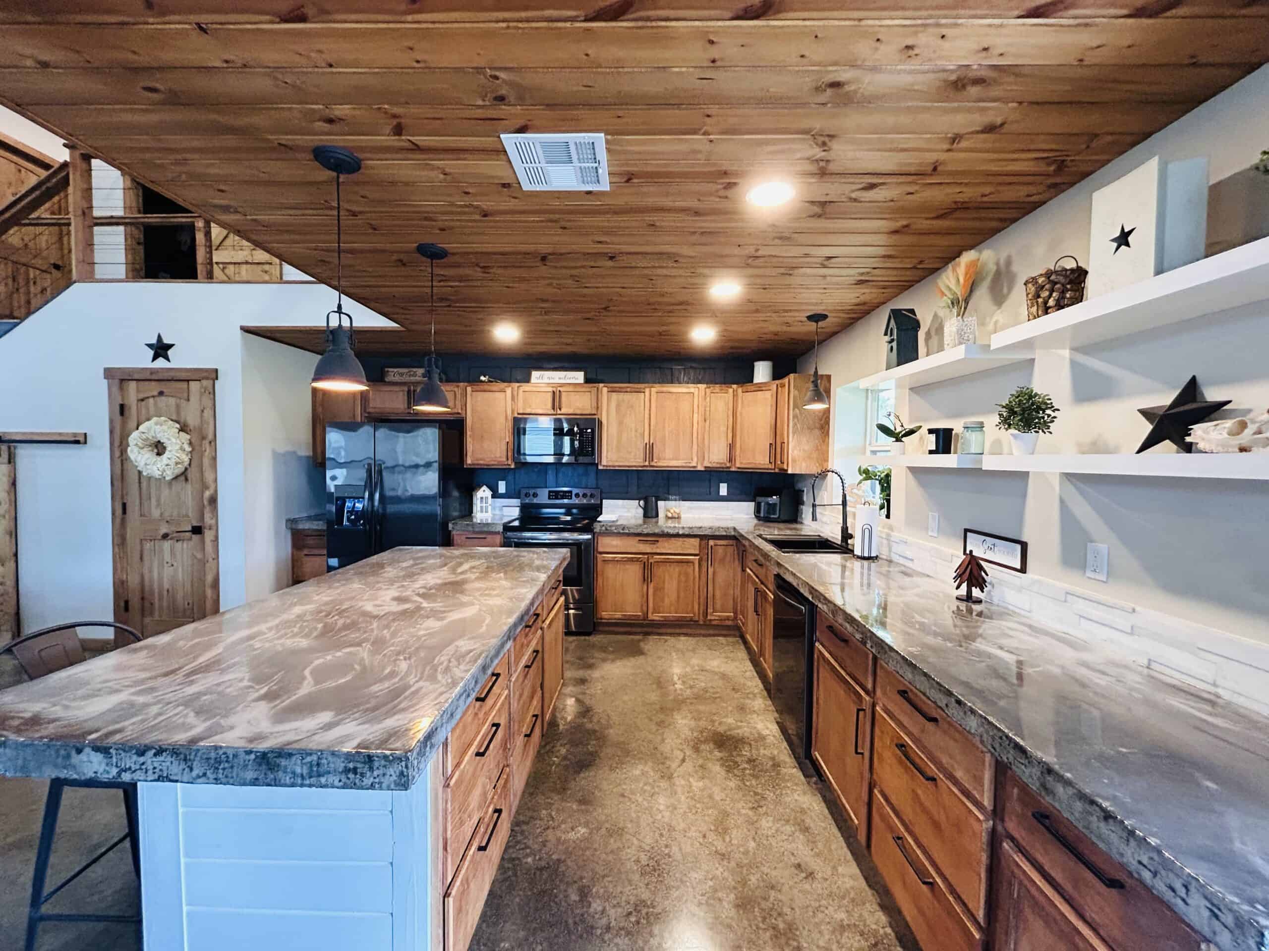 82.61-Acre Hunter’s Retreat with Stocked Lake & Barndominium