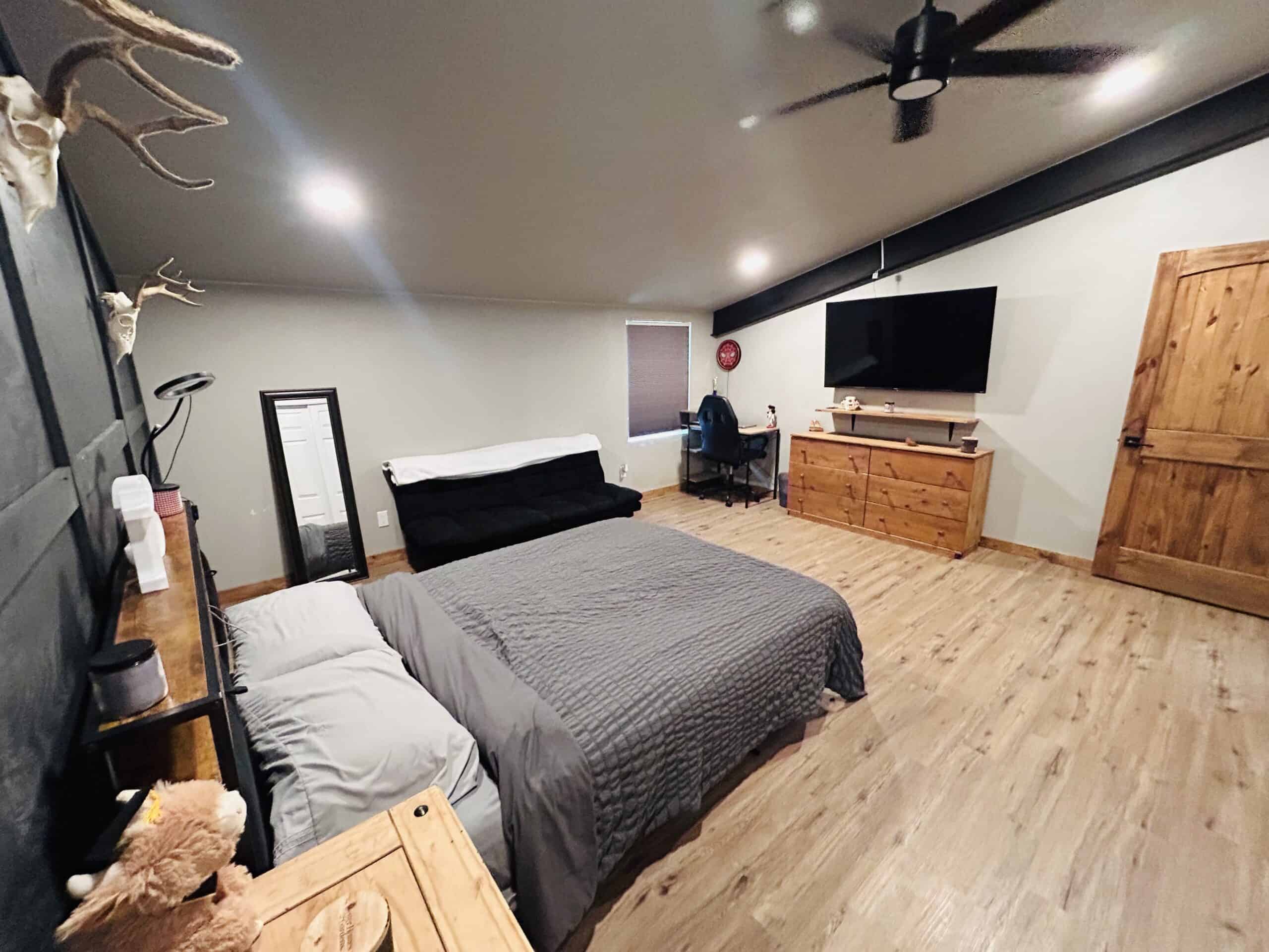 82.61-Acre Hunter’s Retreat with Stocked Lake & Barndominium