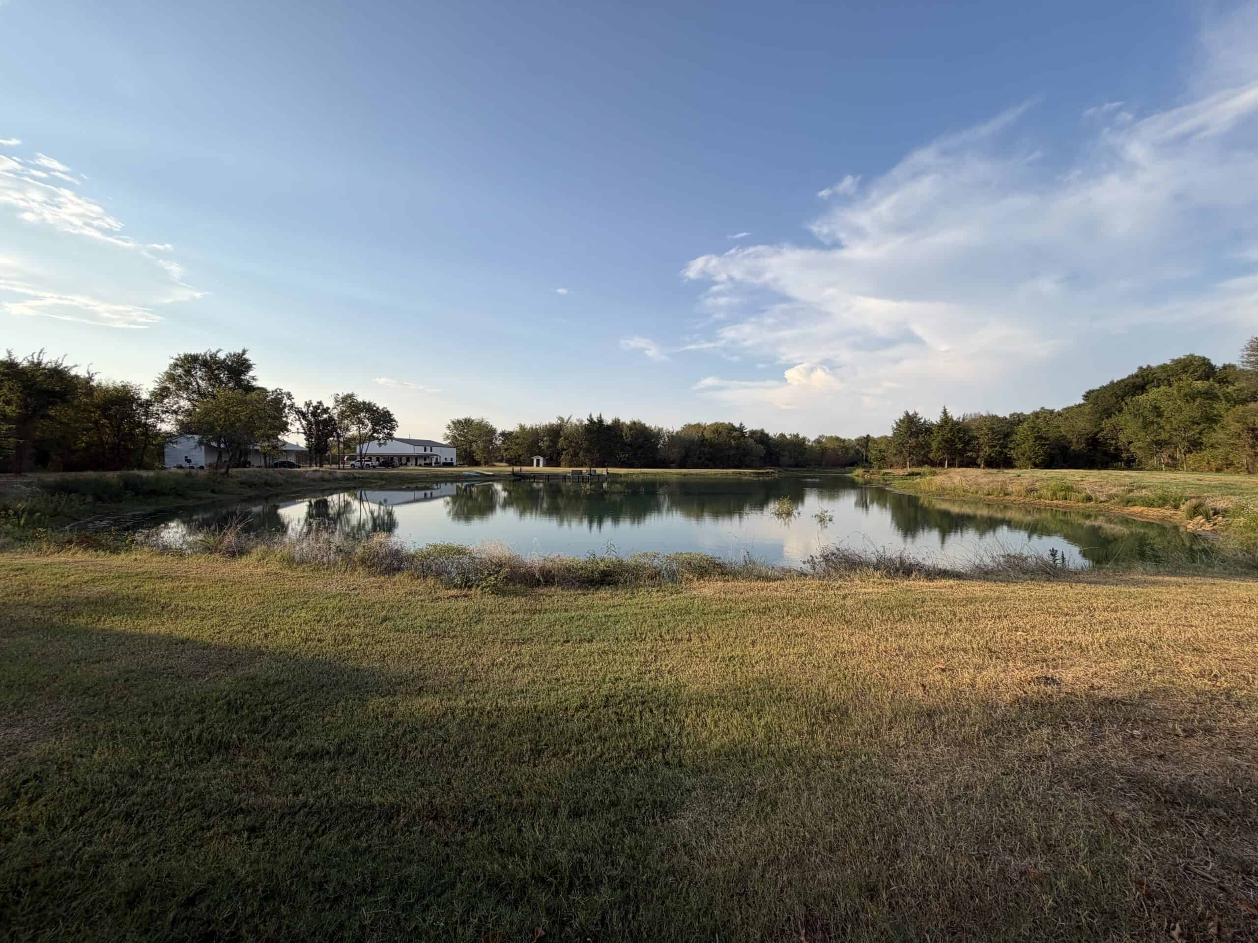 82.61-Acre Hunter’s Retreat with Stocked Lake & Barndominium