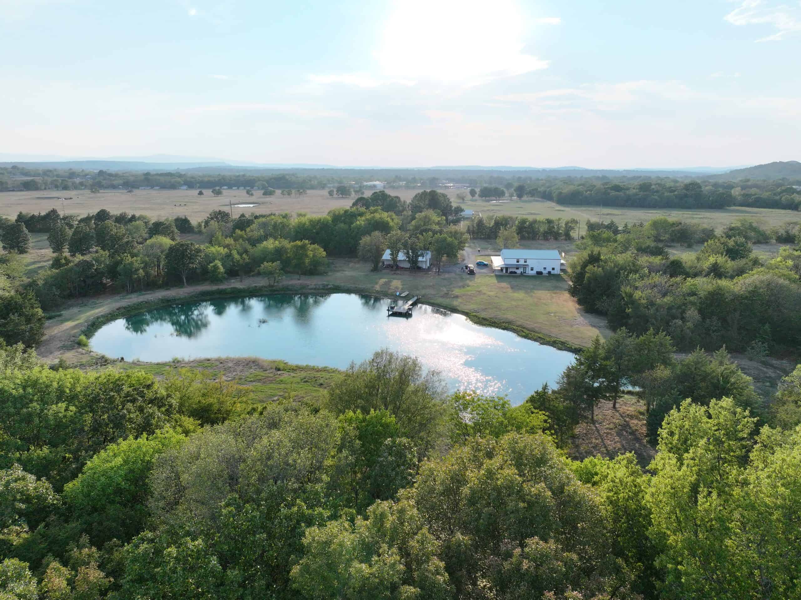 82.61-Acre Hunter’s Retreat with Stocked Lake & Barndominium