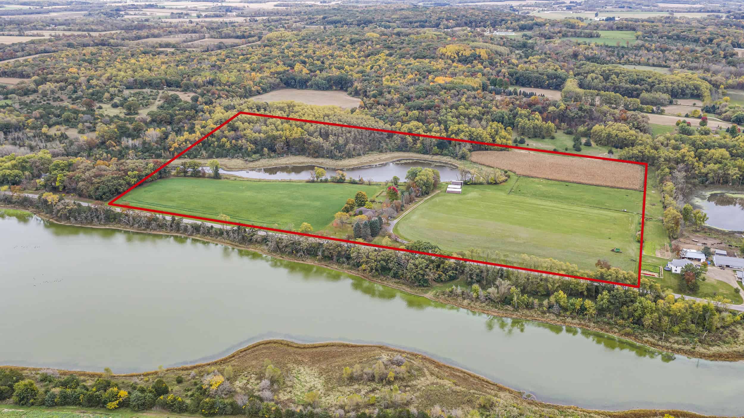 LIVE & ONLINE REAL ESTATE AUCTION – 50.82± Acres with 7-Acre Lake, Home & Outbuildings