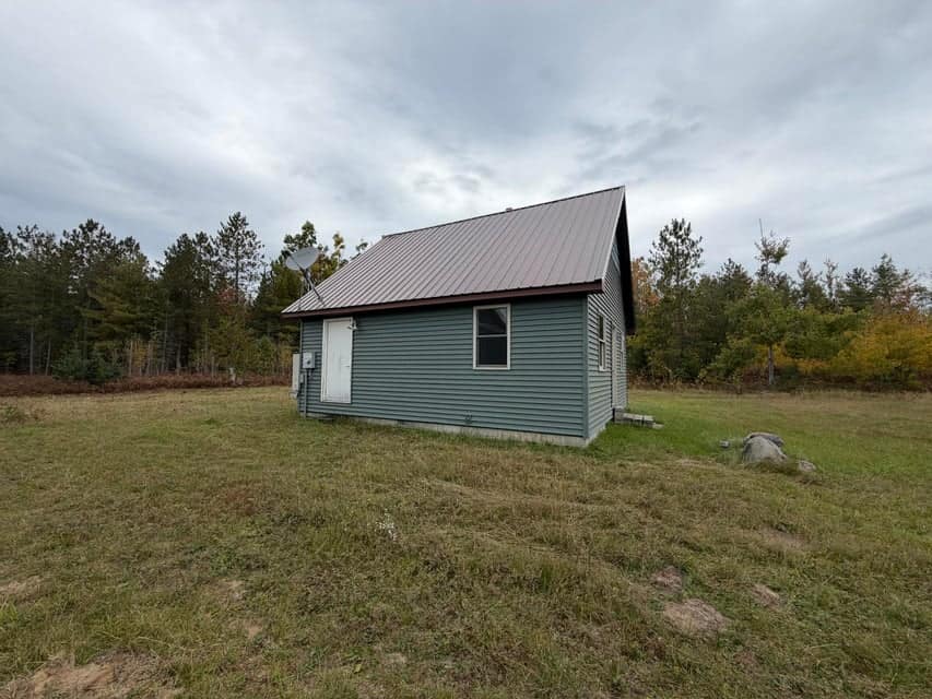 120-Acre Northern Michigan Hunting Retreat with Turnkey Cabin in Hillman MI