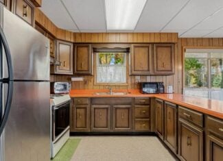 Charming Vintage Home on Canada Creek Ranch – 5.5 Lots Atlanta MI