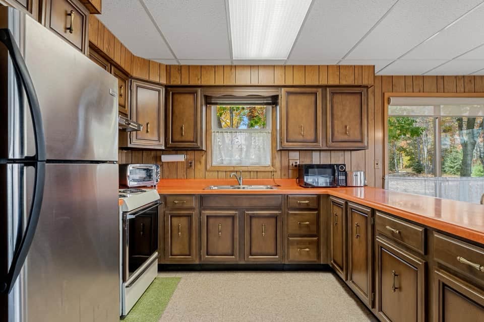 Charming Vintage Home on Canada Creek Ranch – 5.5 Lots Atlanta MI